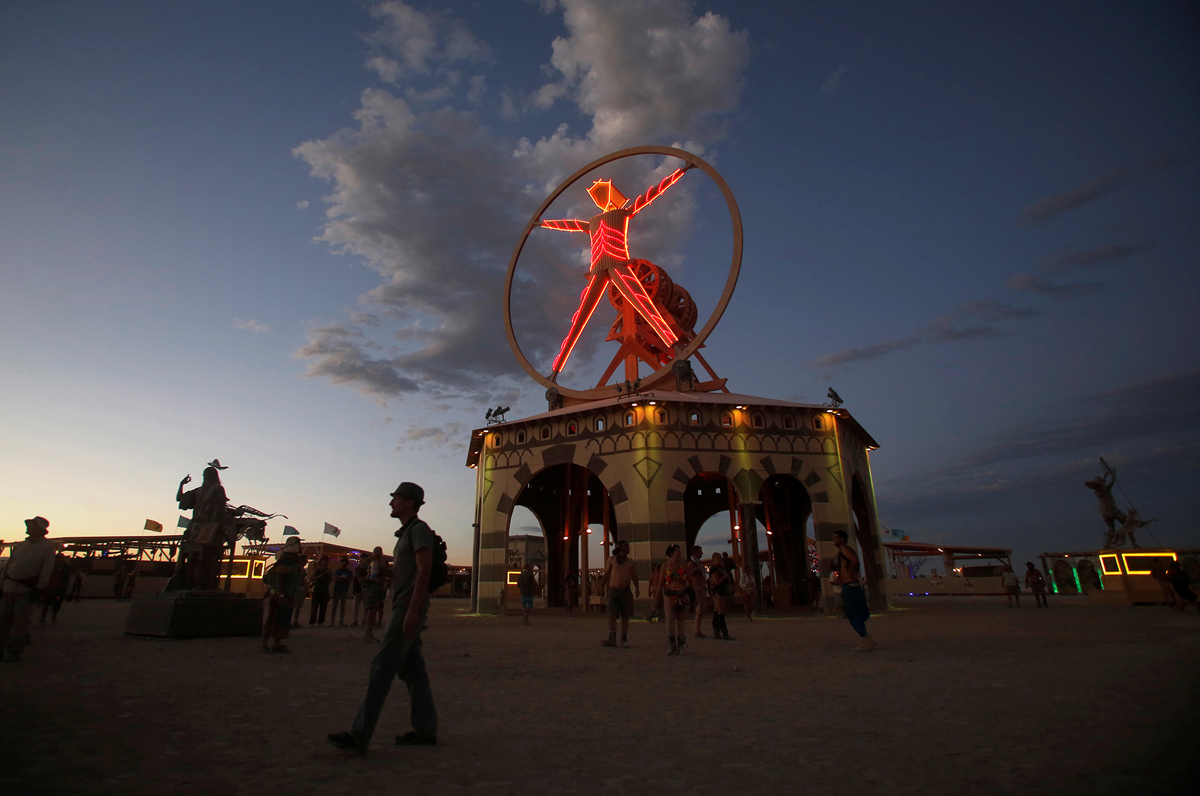 The Man is illuminated as approximately 70,000 people from all over the world gather for the 30th annual Burning Man arts and music festival in the Black Rock Desert of Nevada, U.S. August 31, 2016. REUTERS/Jim Urquhart FOR USE WITH BURNING MAN RELATED REPORTING ONLY. FOR EDITORIAL USE ONLY. NOT FOR SALE FOR MARKETING OR ADVERTISING CAMPAIGNS. NO THIRD PARTY SALES. NOT FOR USE BY REUTERS THIRD PARTY DISTRIBUTORS - RTX2NR8O
